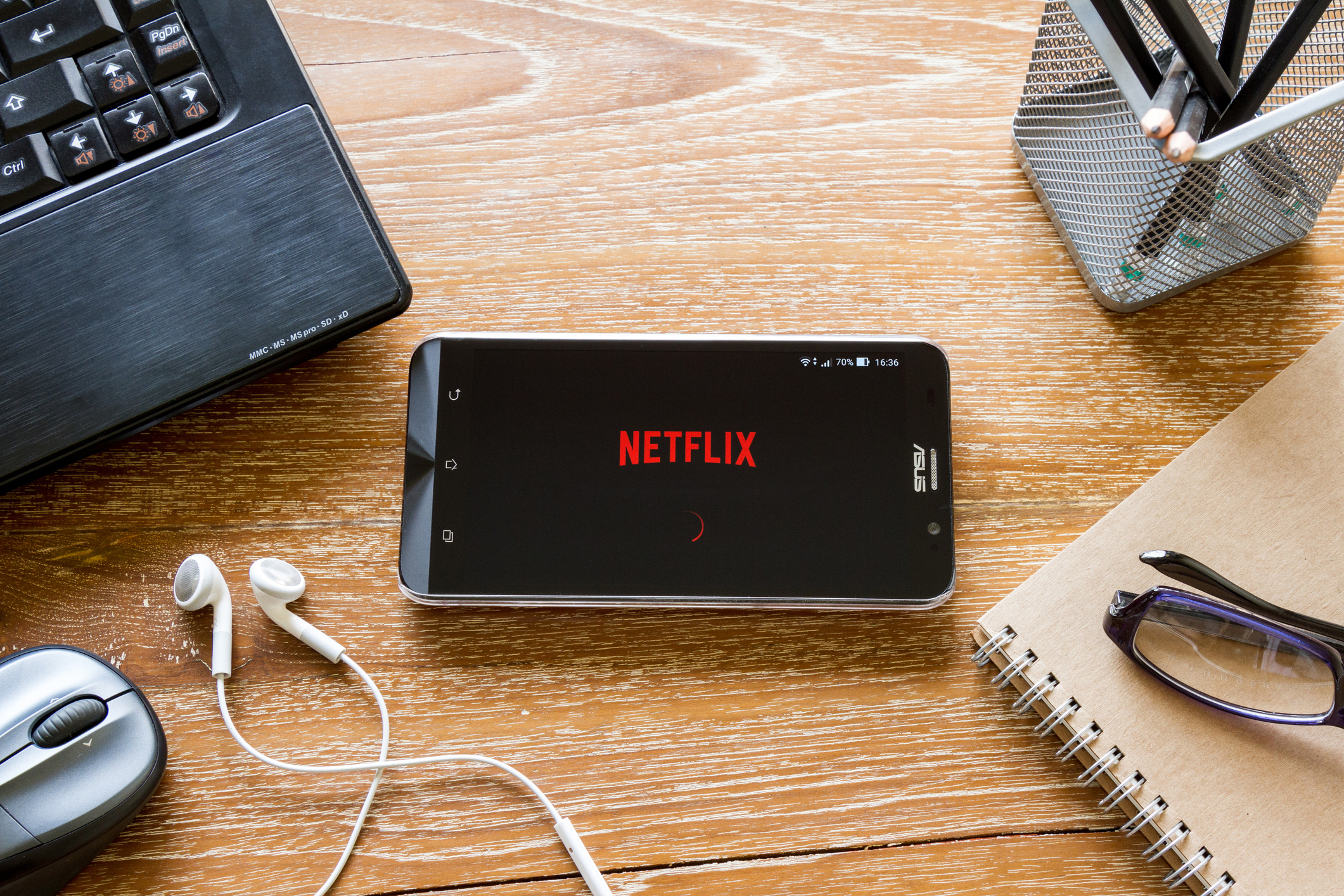 screen shot of Netflix application Chiang Mai, Thailand - March 22, 2016: screen shot of Netflix application showing on Asus Zenfone 2 mobile phone. Netflix is a global provider of streaming movies and TV series.