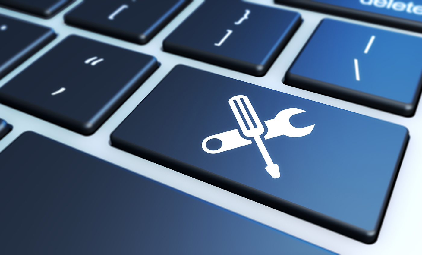 Computer Service Work Tool Icon Computer service and assistance concept with work tool icon on a laptop keyboard 3D illustration.