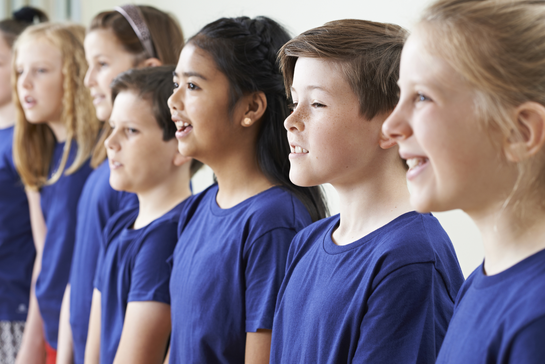 Group Of School Children Singing In Choir Together Group Of School Children Singing In Choir Together